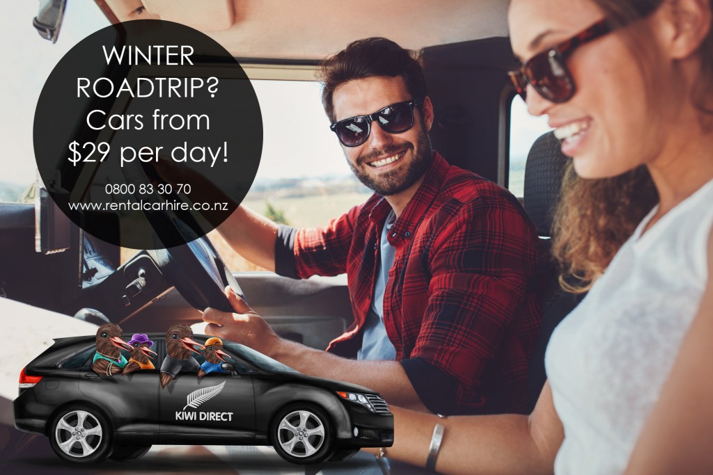 Young couple sitting inside their car with map. Smiling young man and woman sitting together and looking at the map for directions.